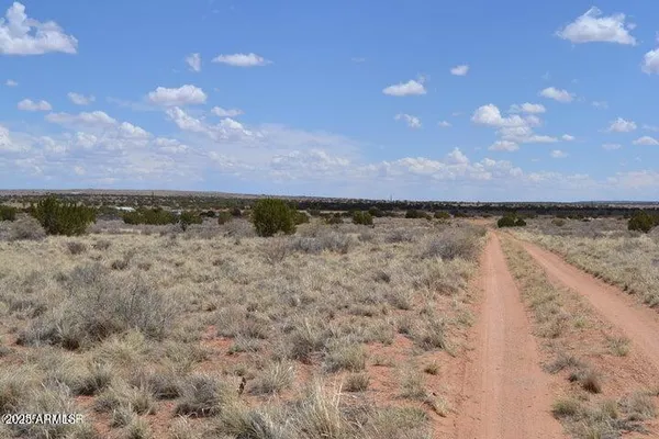 a view of ocean with sunset