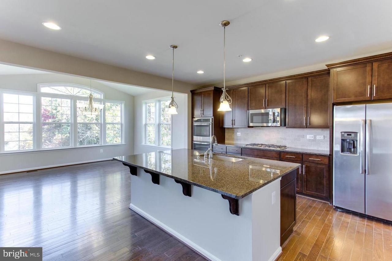 1032 Briggs Chaney Road Silver Spring, MD 20905 - Photo 11 of 30 Luxury Open Kitchen Design w/ Huge Center Island