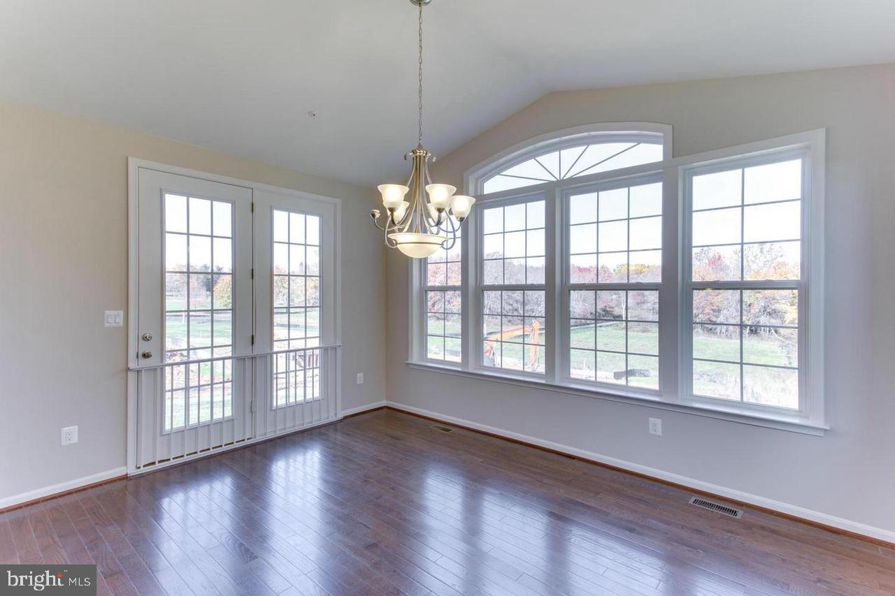 1032 Briggs Chaney Road Silver Spring, MD 20905 - Photo 17 of 30 Sun Room / Dinning Room open to Huge Deck