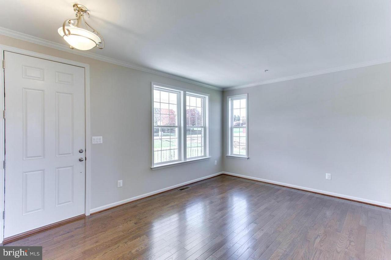 1032 Briggs Chaney Road Silver Spring, MD 20905 - Photo 3 of 30 Foyer & Sitting Area