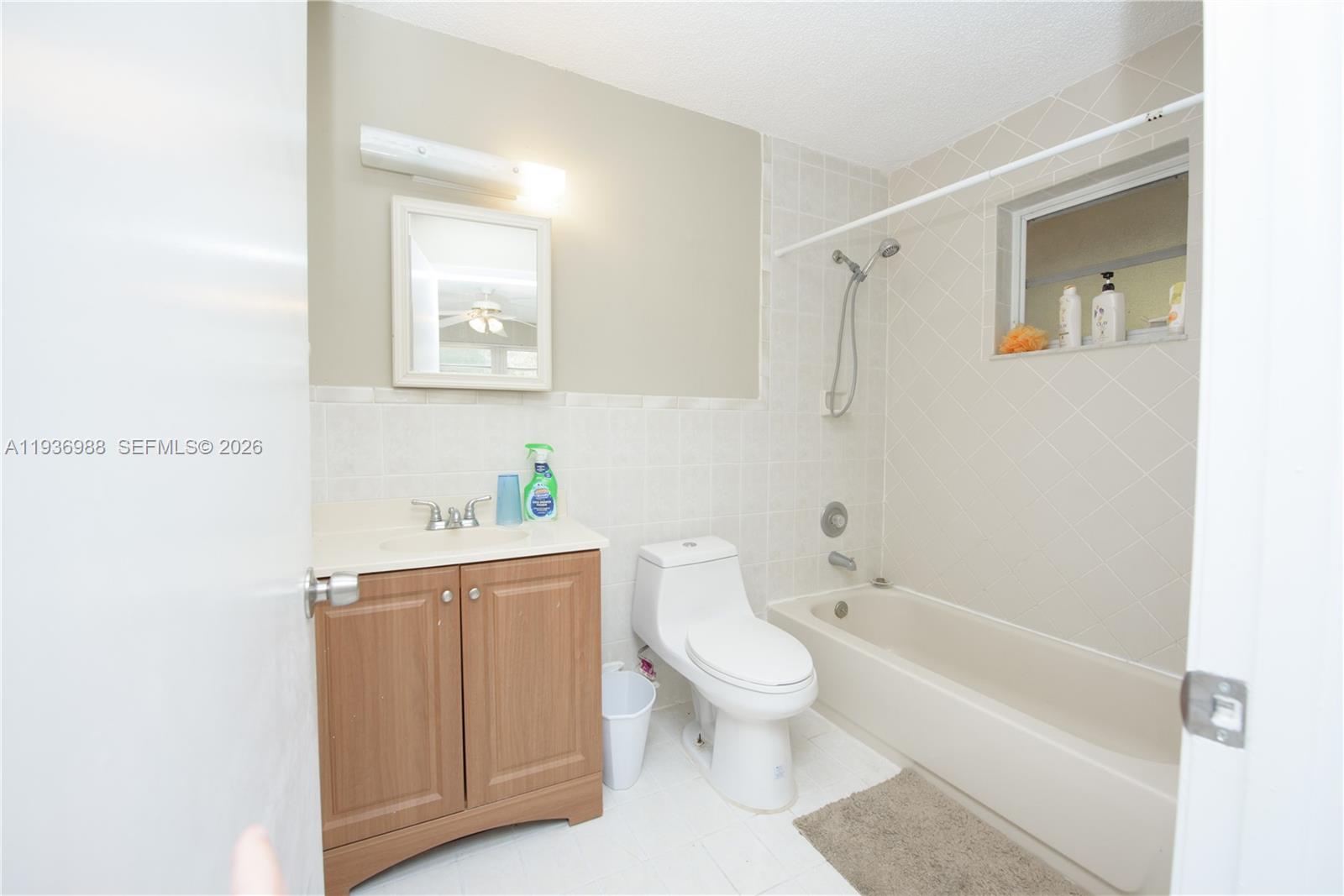 21295 Southwest 376th Street Homestead, FL 33034 - Photo 21 of 51 a bathroom with a toilet a sink and bathtub