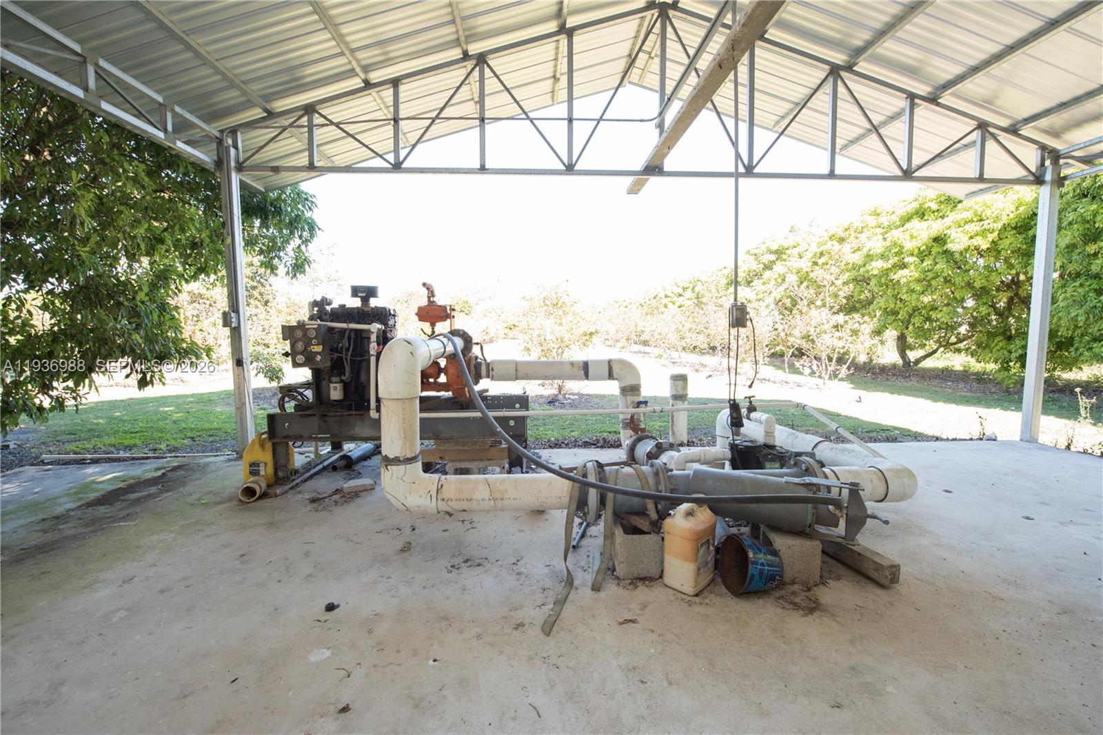 21295 Southwest 376th Street Homestead, FL 33034 - Photo 30 of 51 a view of a swimming pool with a patio