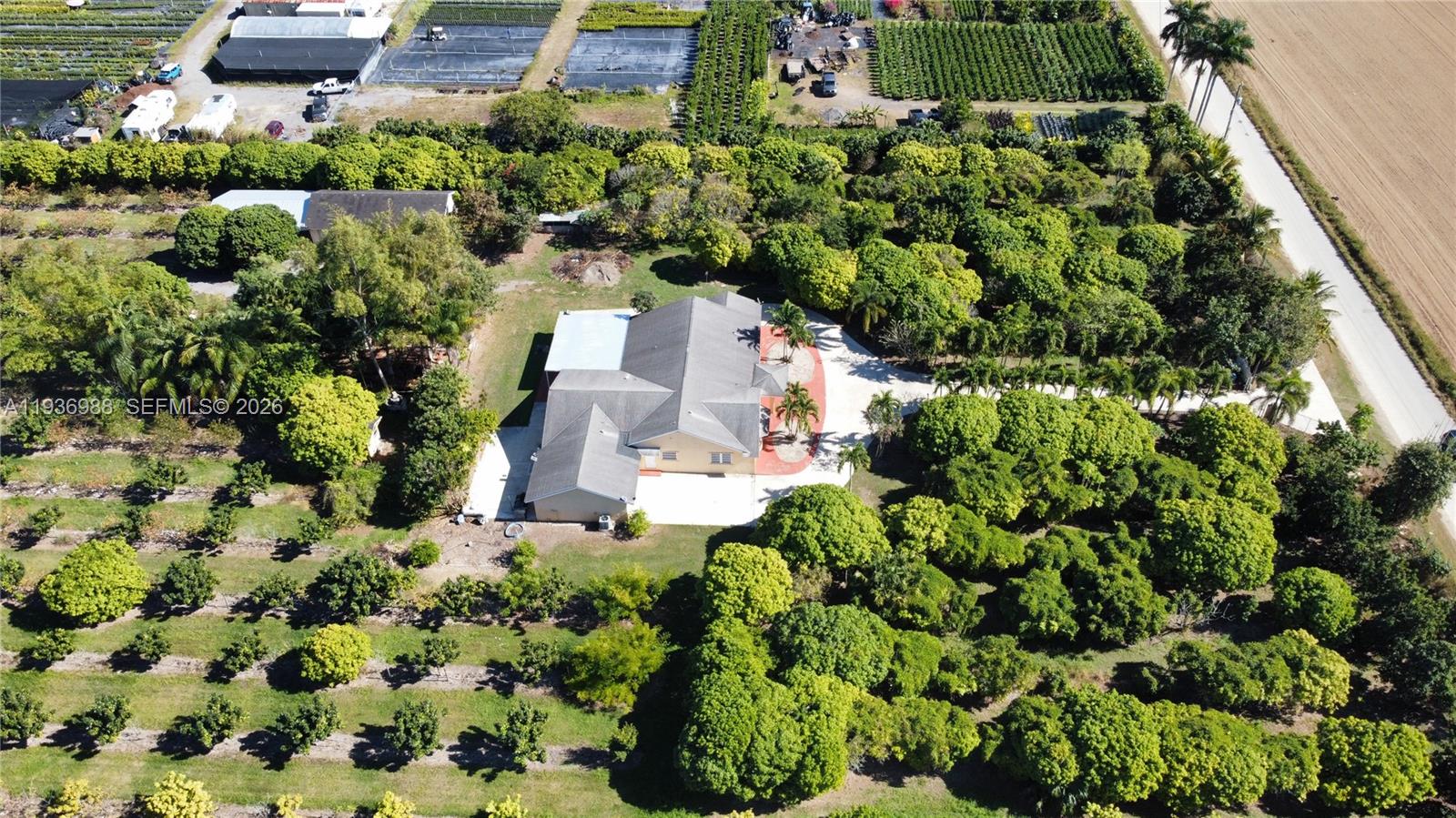 21295 Southwest 376th Street Homestead, FL 33034 - Photo 40 of 51 an aerial view of a house with a yard
