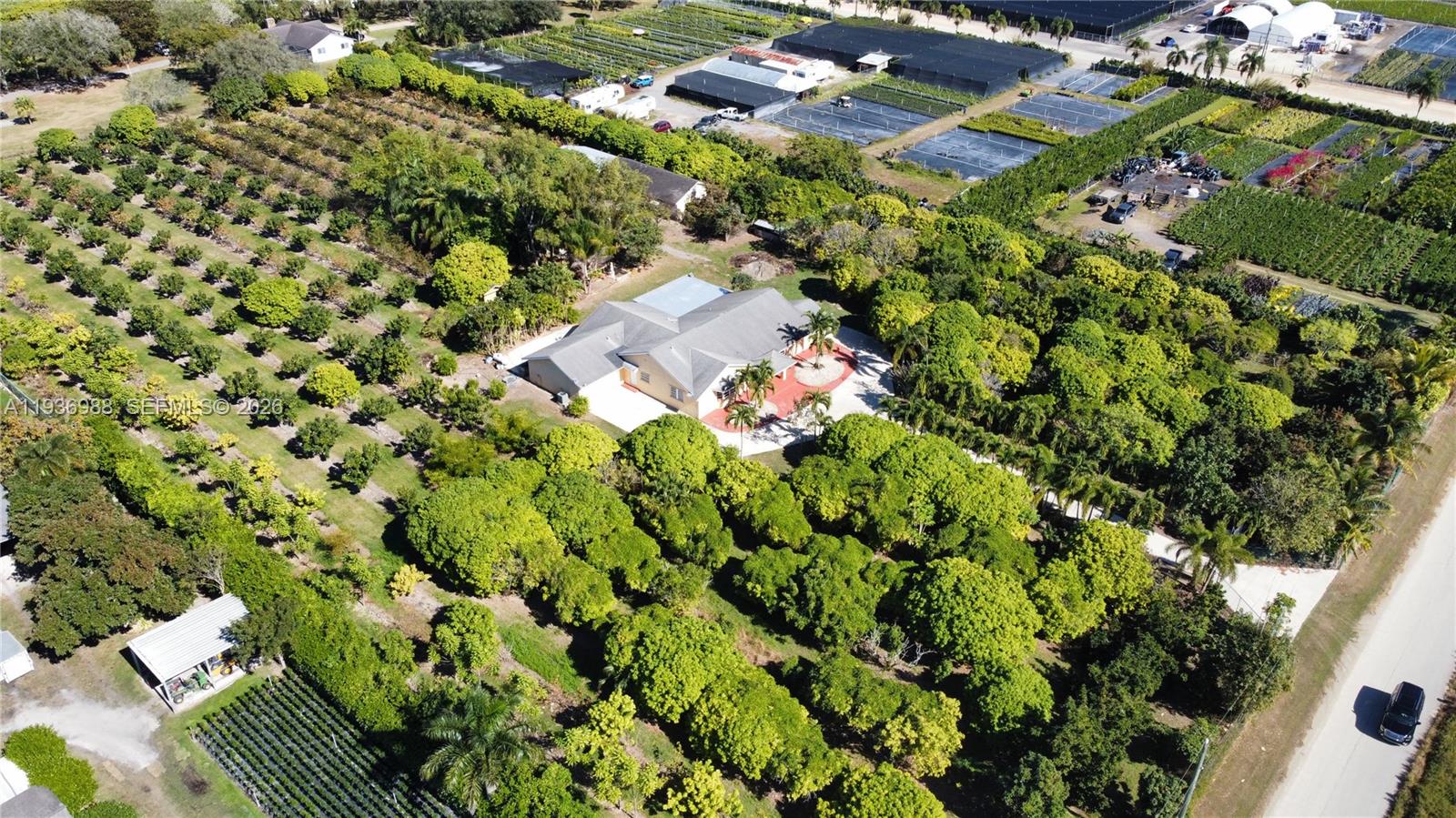 21295 Southwest 376th Street Homestead, FL 33034 - Photo 41 of 51 an aerial view of residential house with an outdoor space and seating