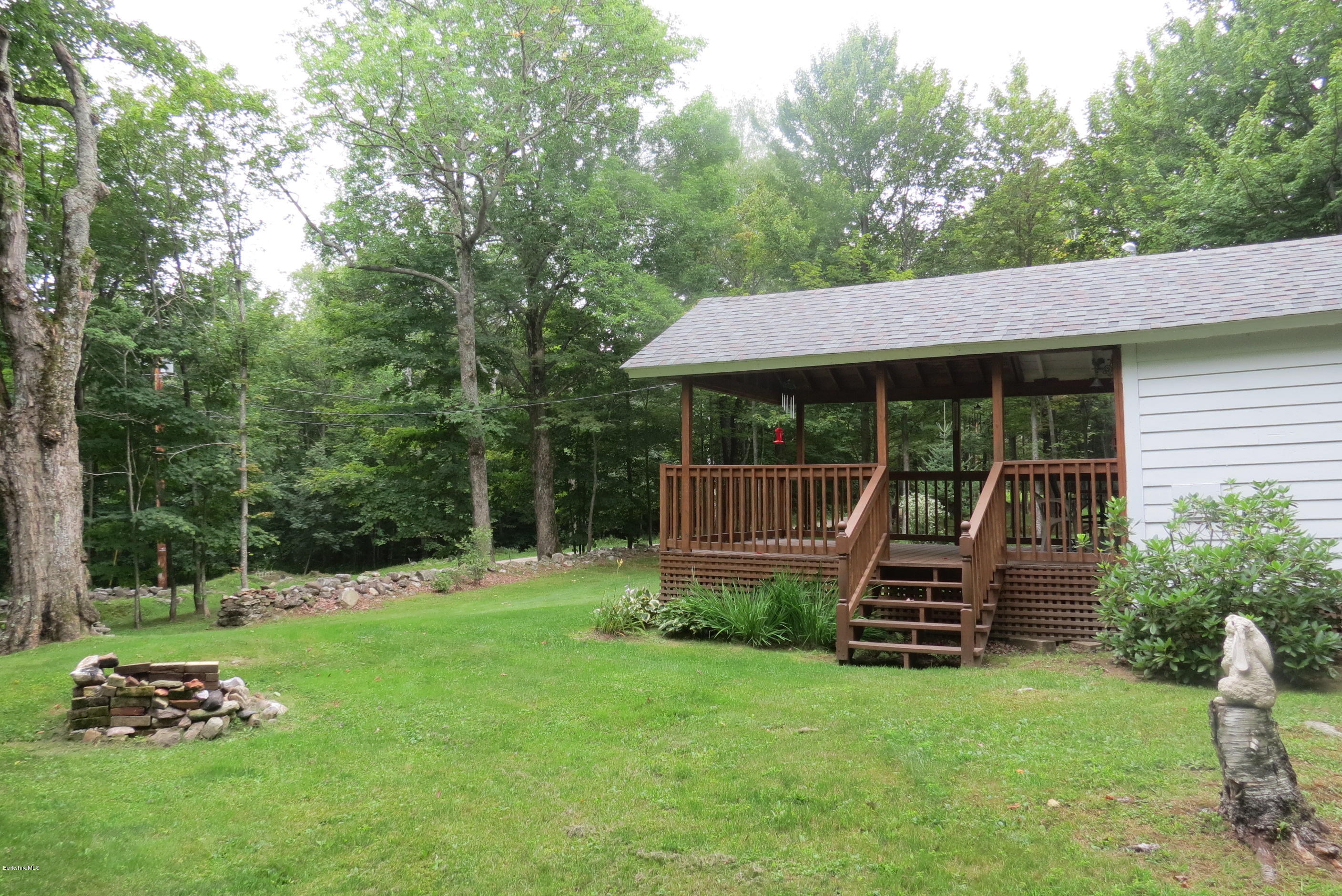 1818-2 County Road Stamford, VT 05352 - Photo 32 of 59 a front view of a house with garden