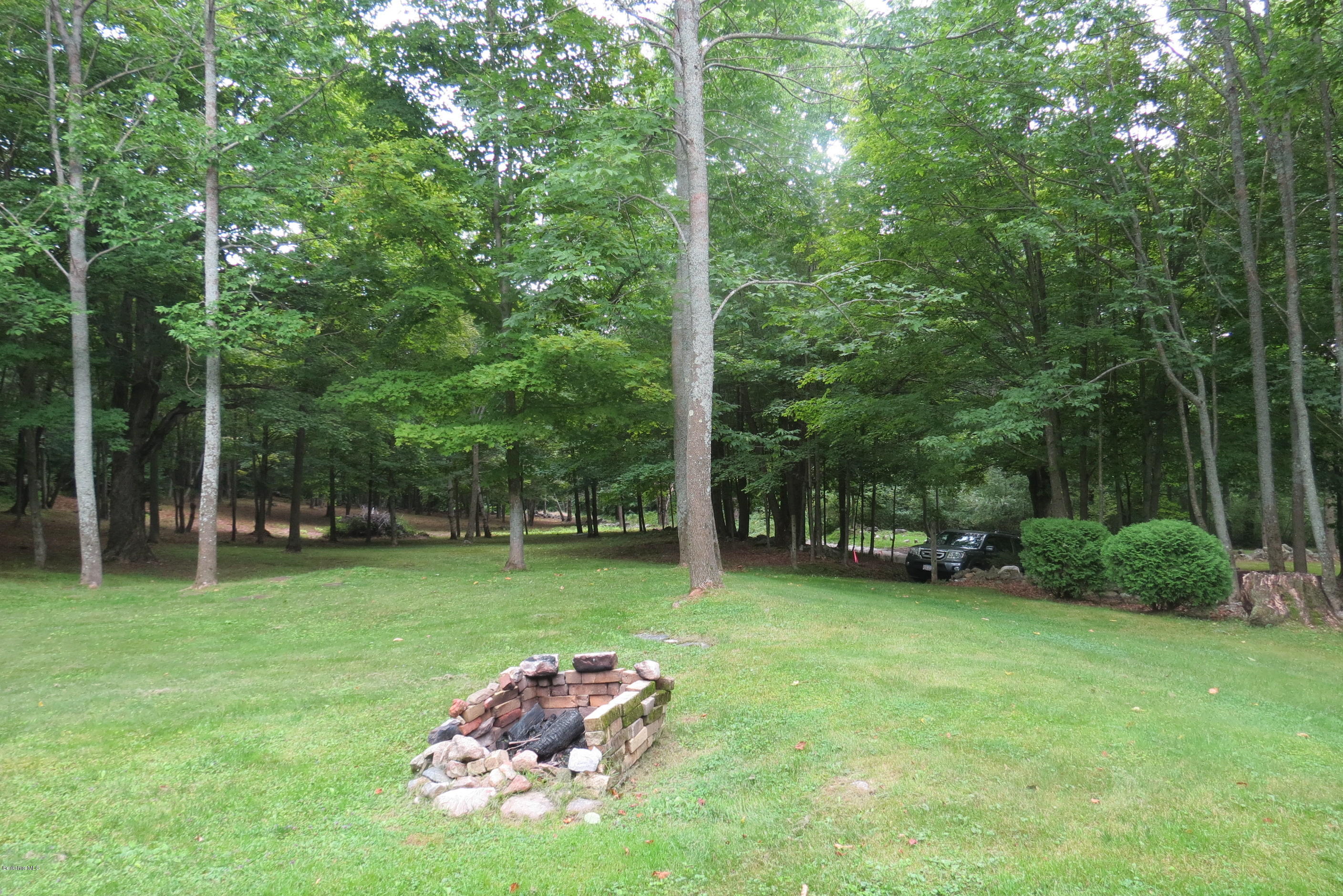 1818-2 County Road Stamford, VT 05352 - Photo 50 of 59 a backyard of a house with lots of green space