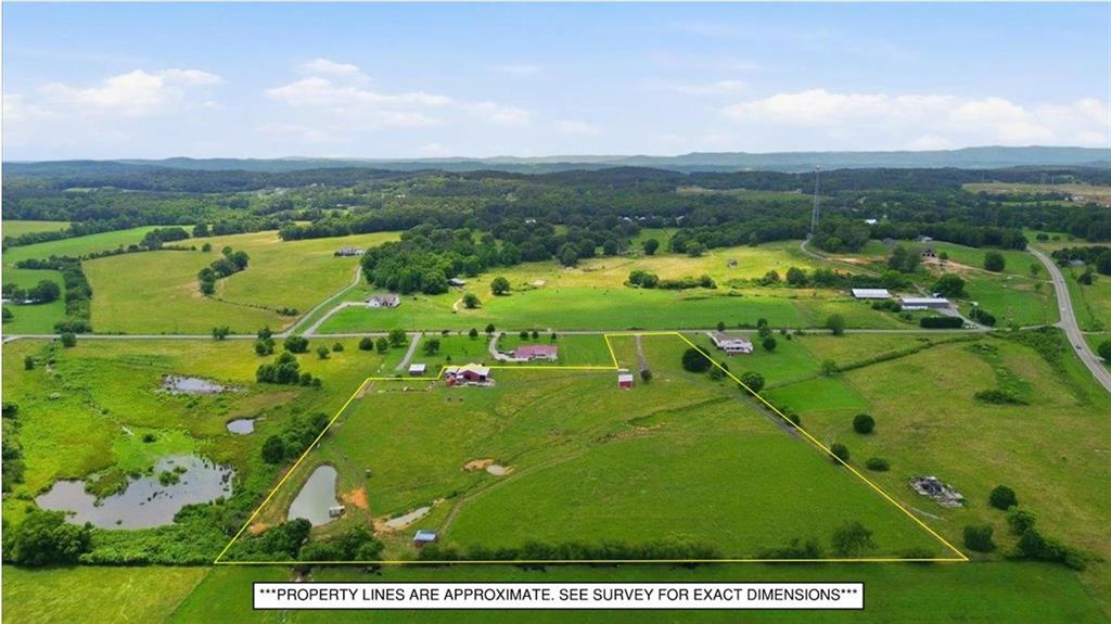 0 Plainview Road Southeast Adairsville, GA 30103 - Photo 2 of 40 an aerial view of a golf course with parking space
