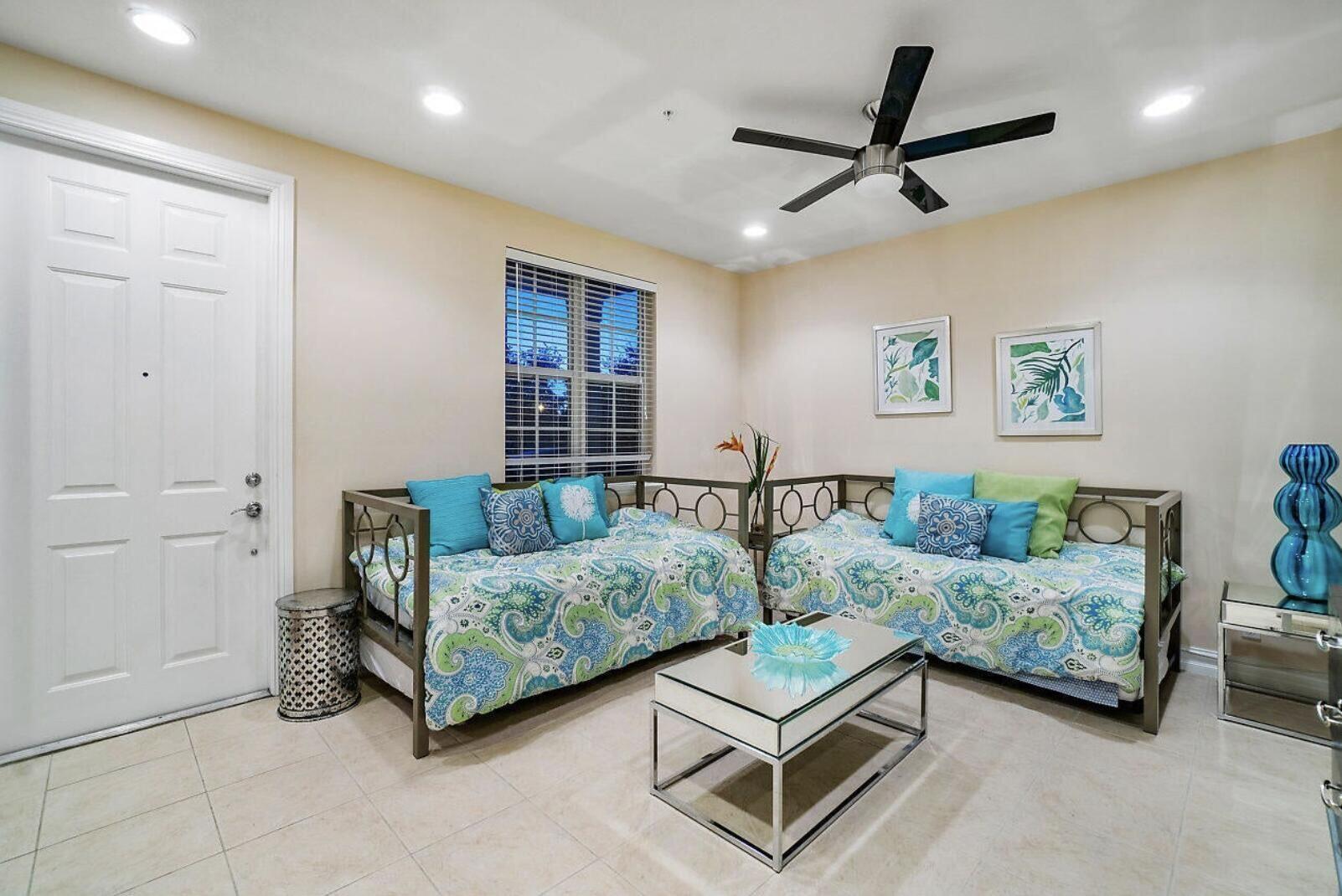 111 Southwest 2nd Avenue Delray Beach, FL 33444 - Photo 2 of 33 a living room with furniture and a window