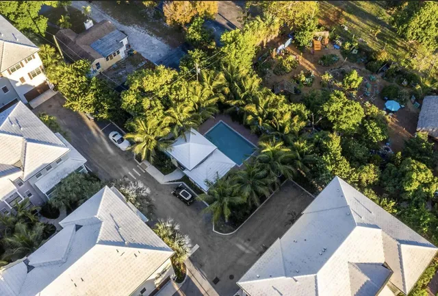an aerial view of house with yard