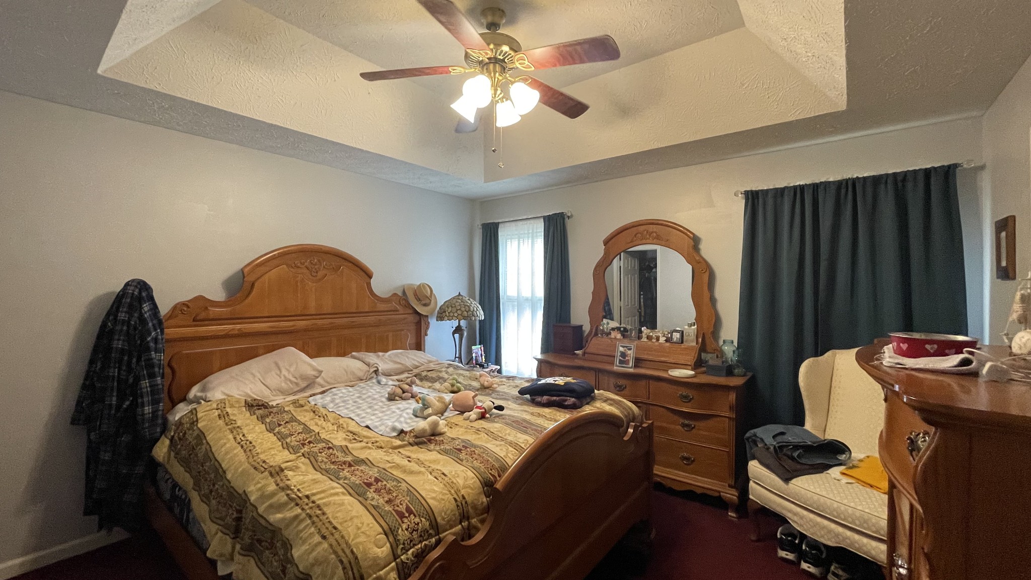 121 Fieldstone Lane Springfield, TN 37172 - Photo 11 of 21 a bedroom with a bed and a chandelier