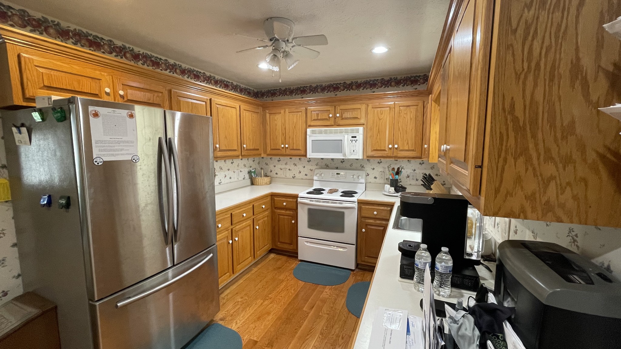 121 Fieldstone Lane Springfield, TN 37172 - Photo 7 of 21 a kitchen with a refrigerator and a stove top oven
