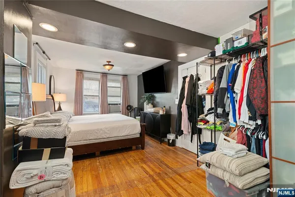 a very nice looking room with a large bed and a window