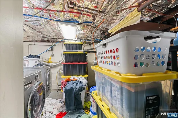 a storage room with washer and dryer