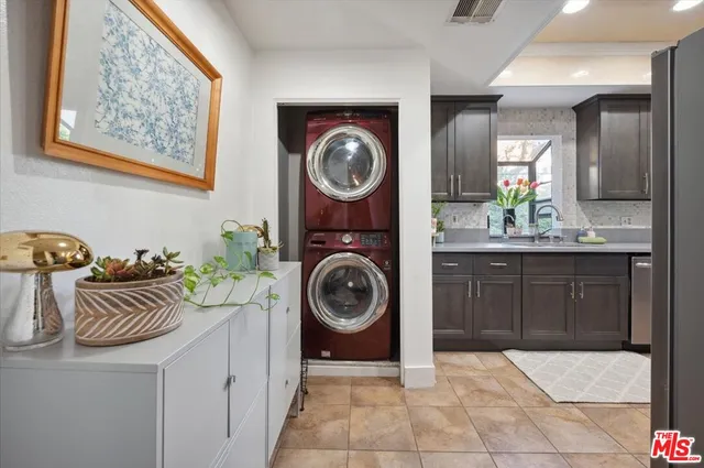 a spacious bathroom with a sink and a mirror