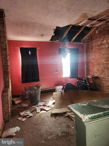 a room with gym equipment and a mirror