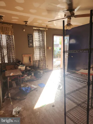 a lobby with furniture and a rug