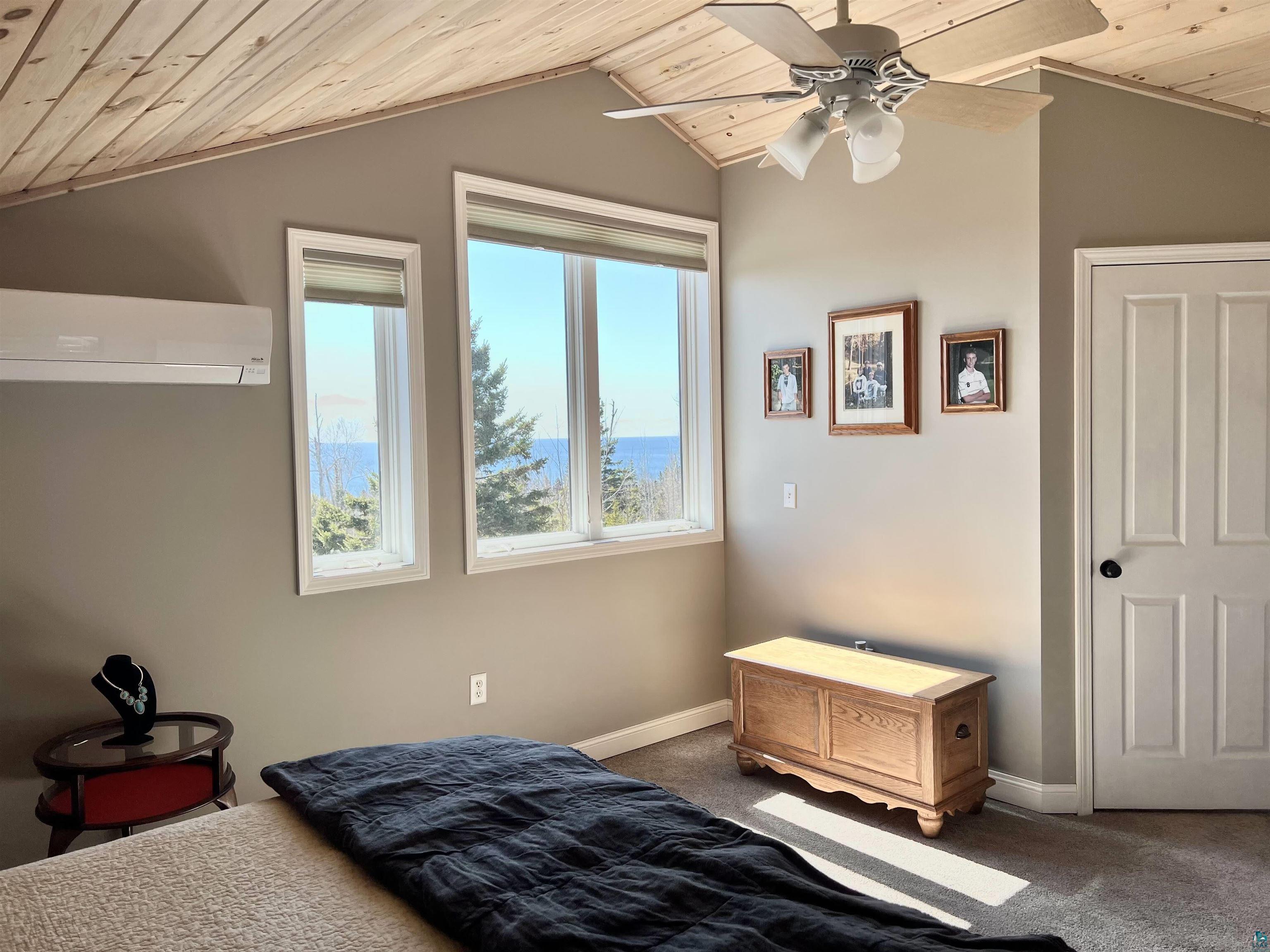 21 Turnagain Trail Lutsen, MN 55612 - Photo 32 of 77 Vaulted wood-paneled ceiling with a central ceiling fan