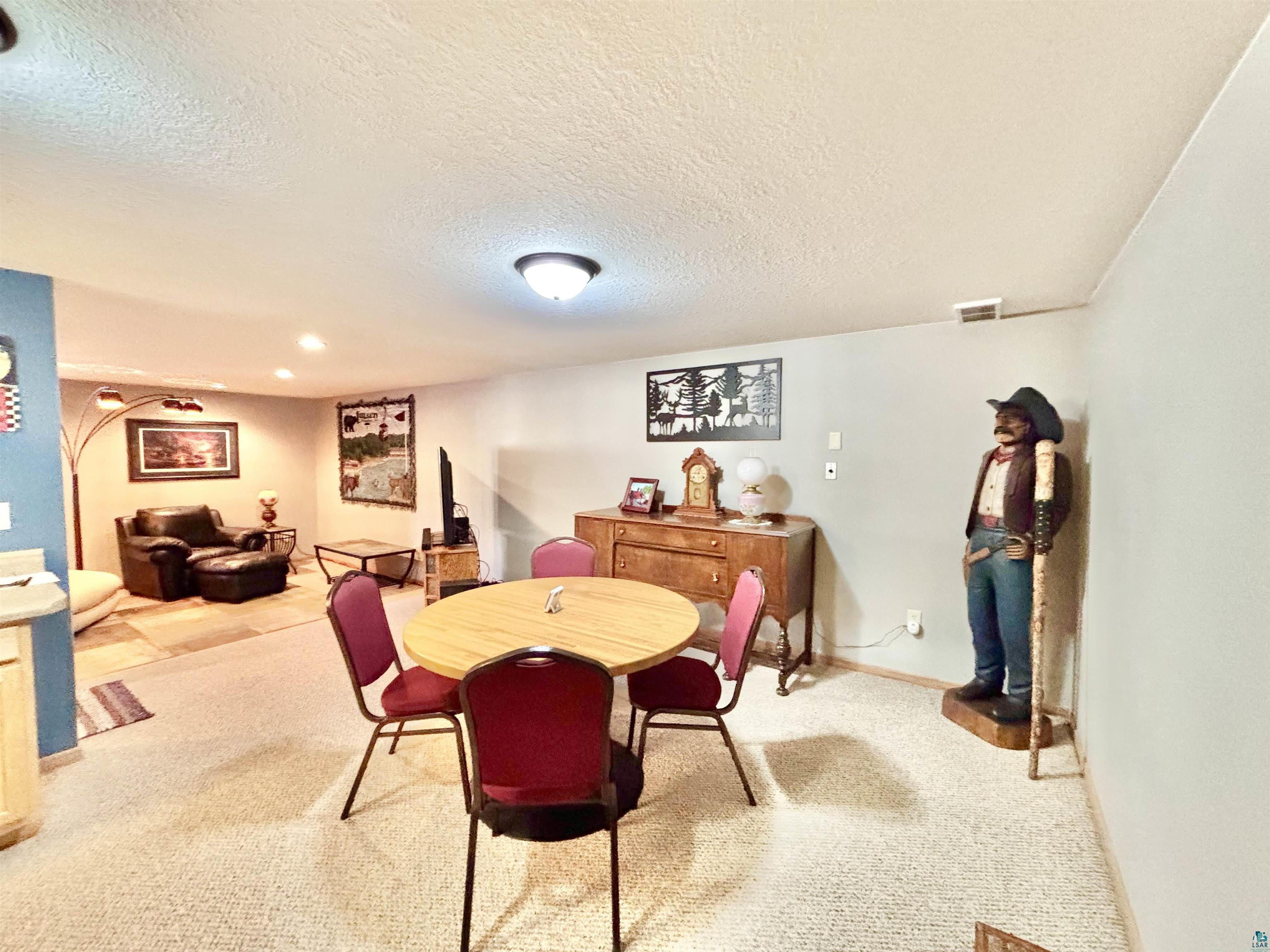 21 Turnagain Trail Lutsen, MN 55612 - Photo 68 of 77 Spacious room featuring light-toned carpeting and neutral wall colors