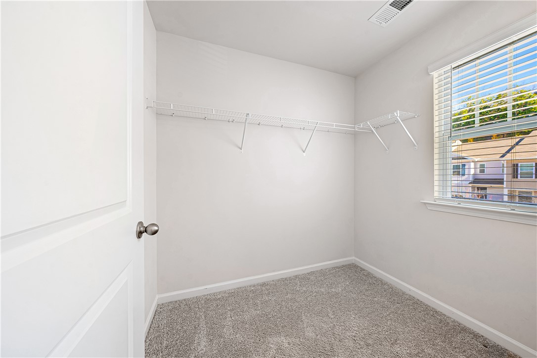 404 Oakmont Valley Trail Seneca, SC 29678 - Photo 22 of 44 This bright closet offers practical storage solutions with an expansive shelving system.