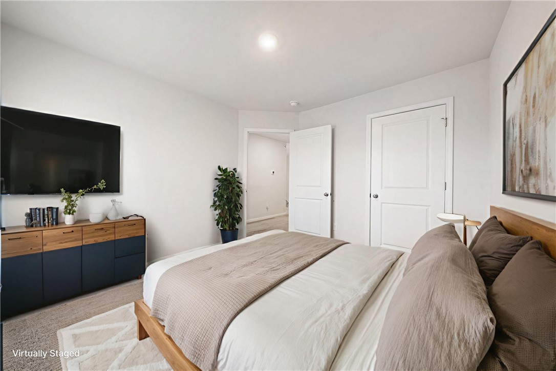 404 Oakmont Valley Trail Seneca, SC 29678 - Photo 25 of 44 This spacious bedroom offers comfortable living with ample light and clean lines.