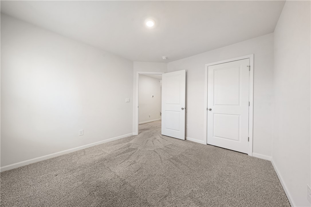404 Oakmont Valley Trail Seneca, SC 29678 - Photo 26 of 44 This cozy room offers ample space and plush carpeting, ready for your personal touch.