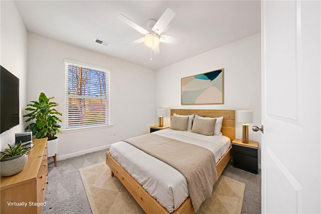 404 Oakmont Valley Trail Seneca, SC 29678 - Photo 28 of 44 This inviting bedroom provides a comfortable and tranquil retreat.