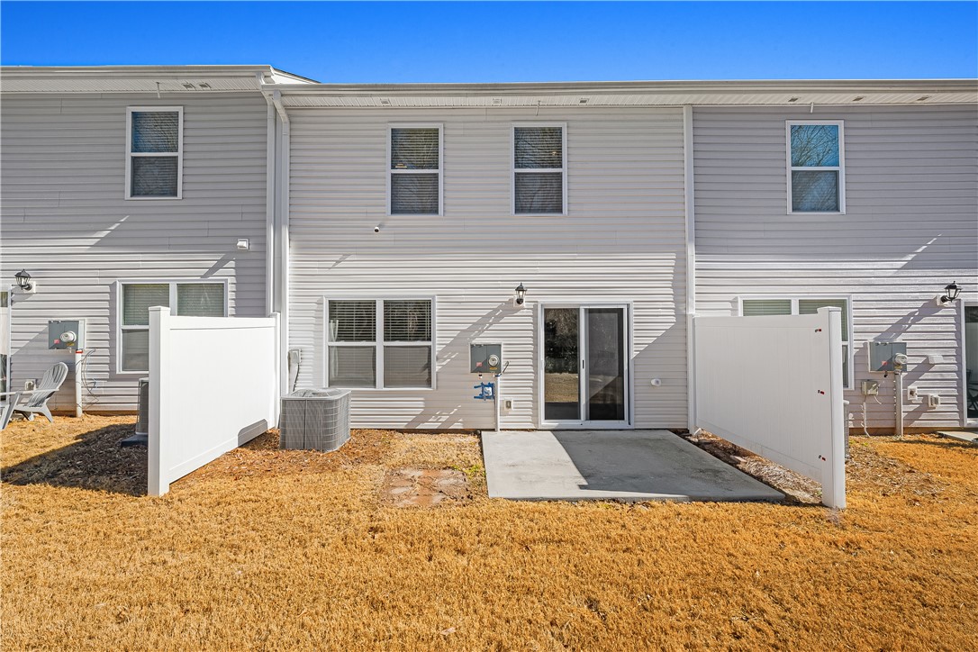 404 Oakmont Valley Trail Seneca, SC 29678 - Photo 33 of 44 This townhome features a private patio, perfect for outdoor living and entertaining.