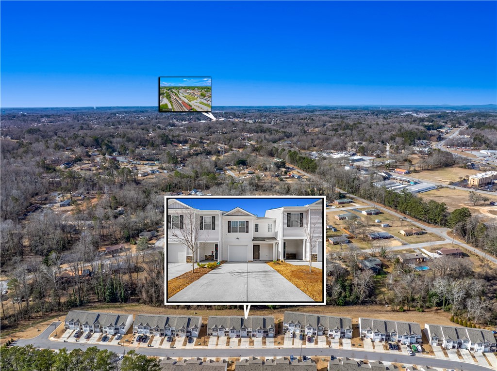 404 Oakmont Valley Trail Seneca, SC 29678 - Photo 36 of 44 This aerial view showcases a vibrant community with modern homes nestled amidst natural surroundings.