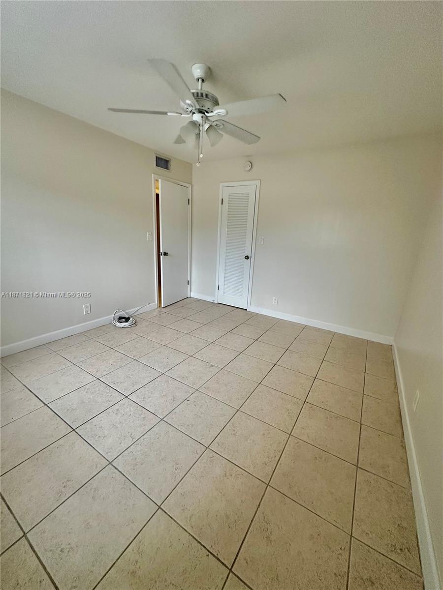 300 Northeast 12th Avenue, Unit 101 Hallandale Beach, FL 33009 - Photo 17 of 23 a view of an empty room