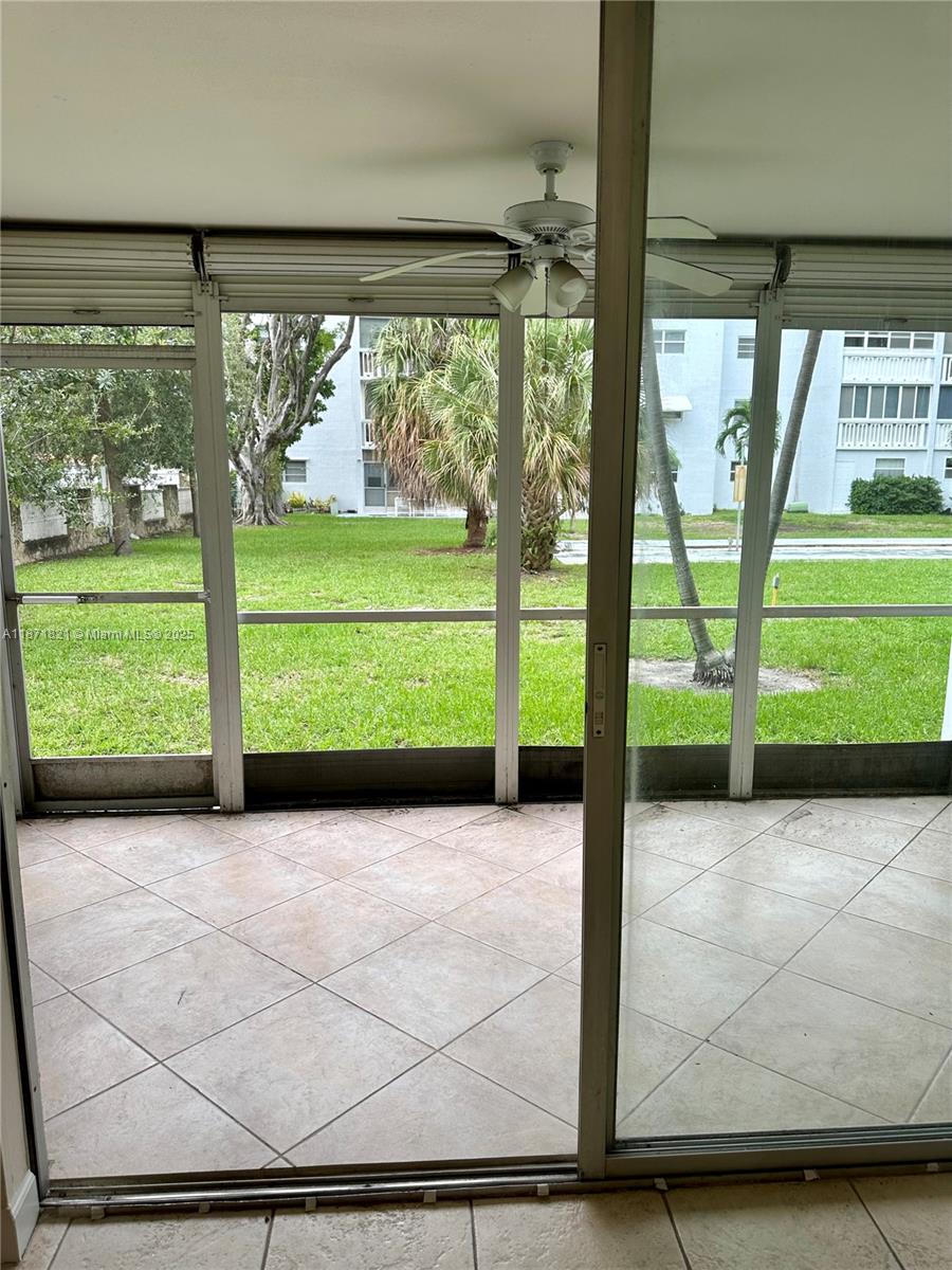 300 Northeast 12th Avenue, Unit 101 Hallandale Beach, FL 33009 - Photo 20 of 23 a view of a room with a large window
