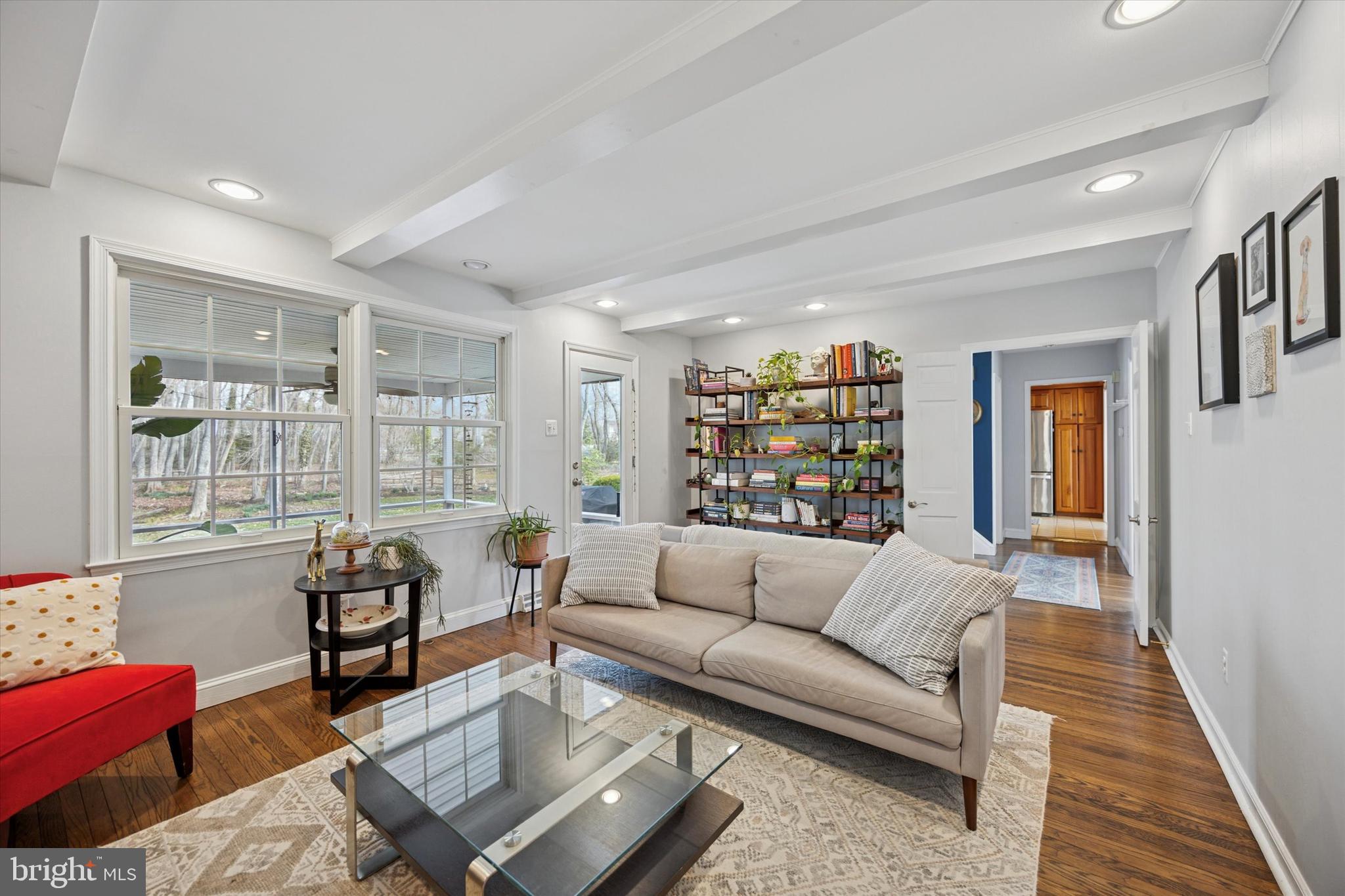 22 Schoolhouse Drive Medford, NJ 08055 - Photo 14 of 26 a living room with furniture and a book shelf