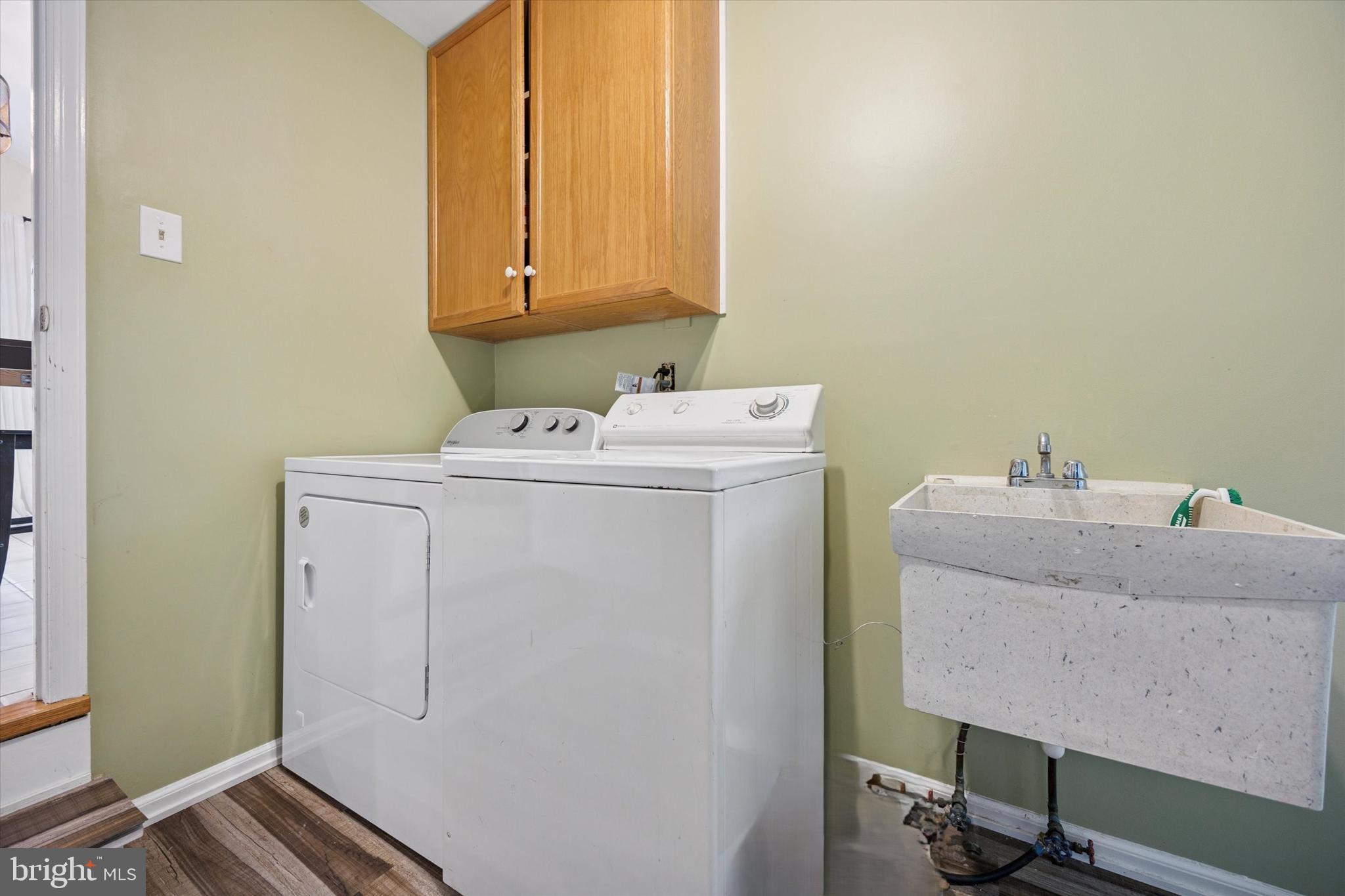 22 Schoolhouse Drive Medford, NJ 08055 - Photo 23 of 26 a utility room with dryer and washer