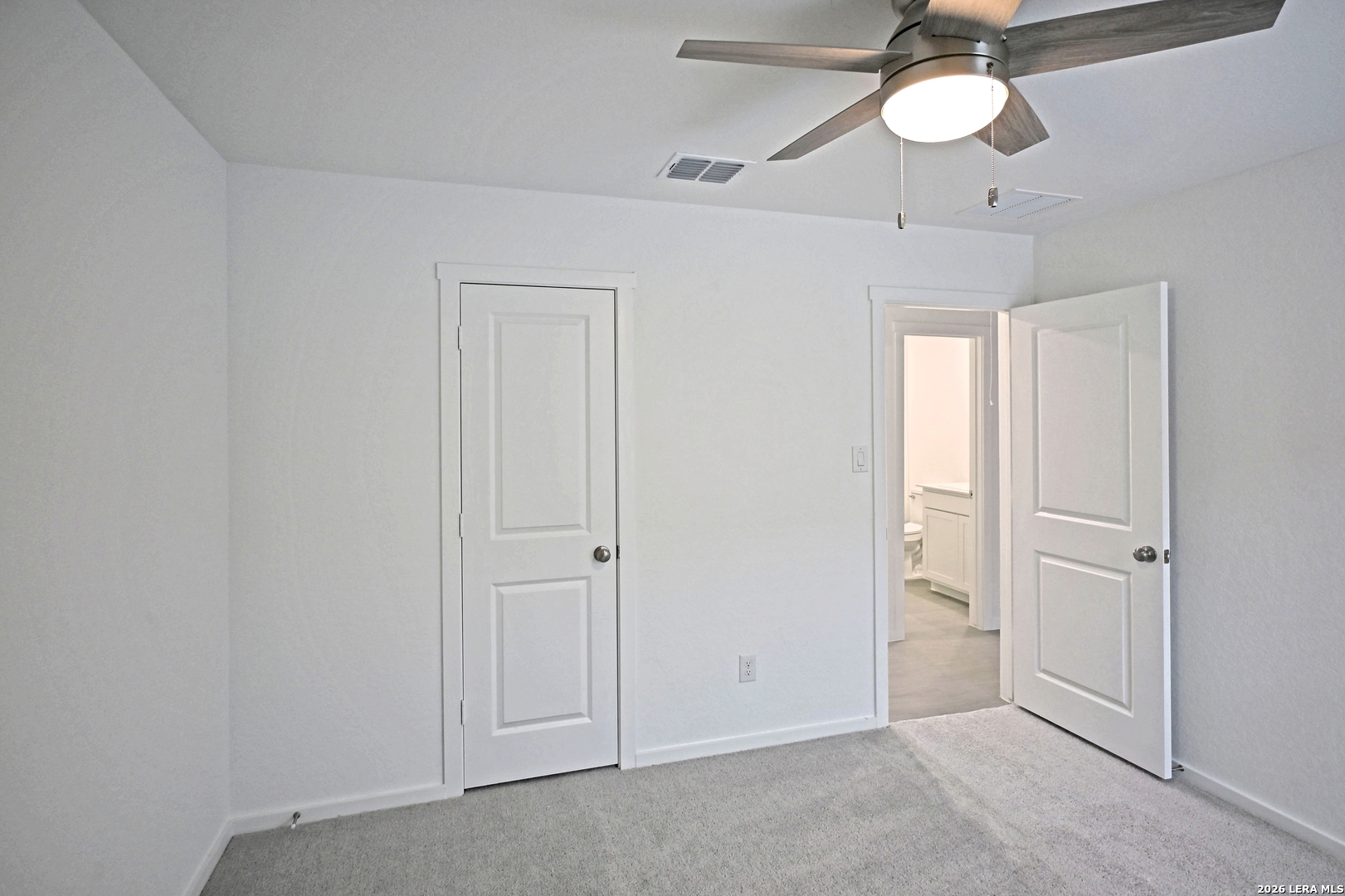 9902 Mather Way Converse, TX 78109 - Photo 14 of 18 wooden floor in an empty room