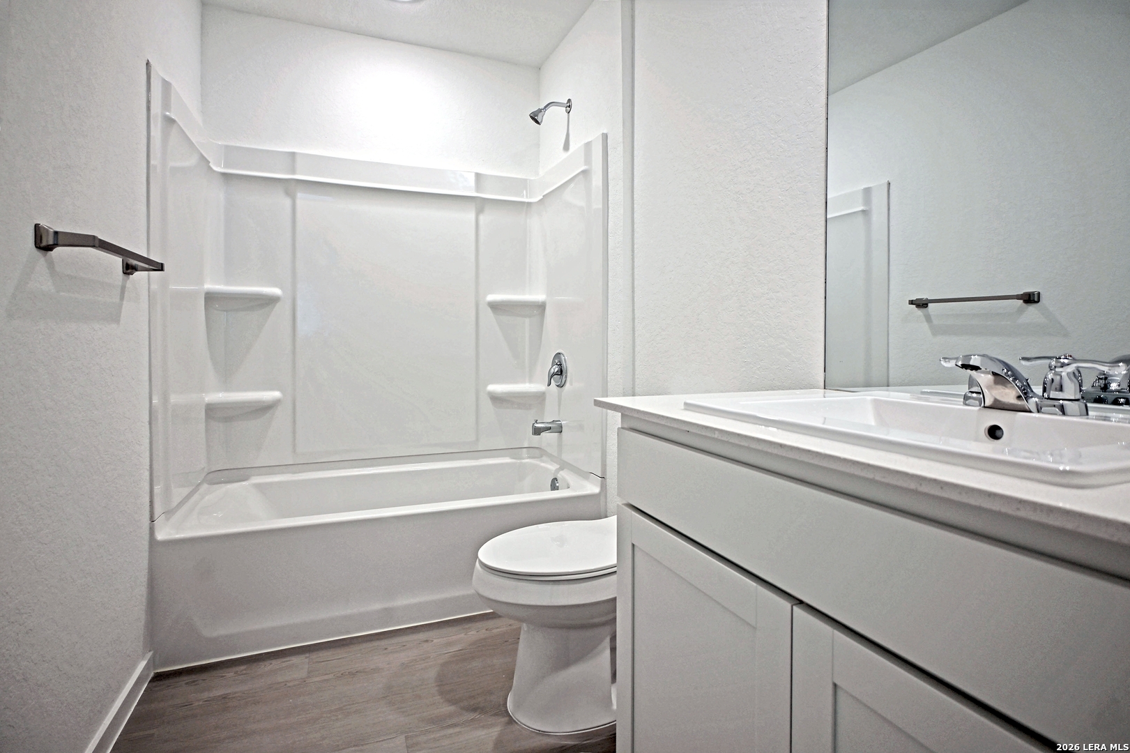 9902 Mather Way Converse, TX 78109 - Photo 15 of 18 a bathroom with a sink a toilet and a bathtub