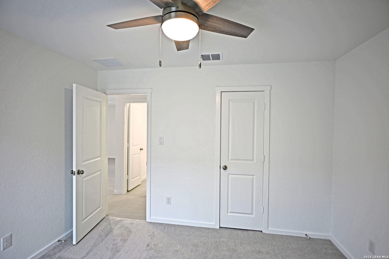 9902 Mather Way Converse, TX 78109 - Photo 17 of 18 a view of a room with a chandelier fan