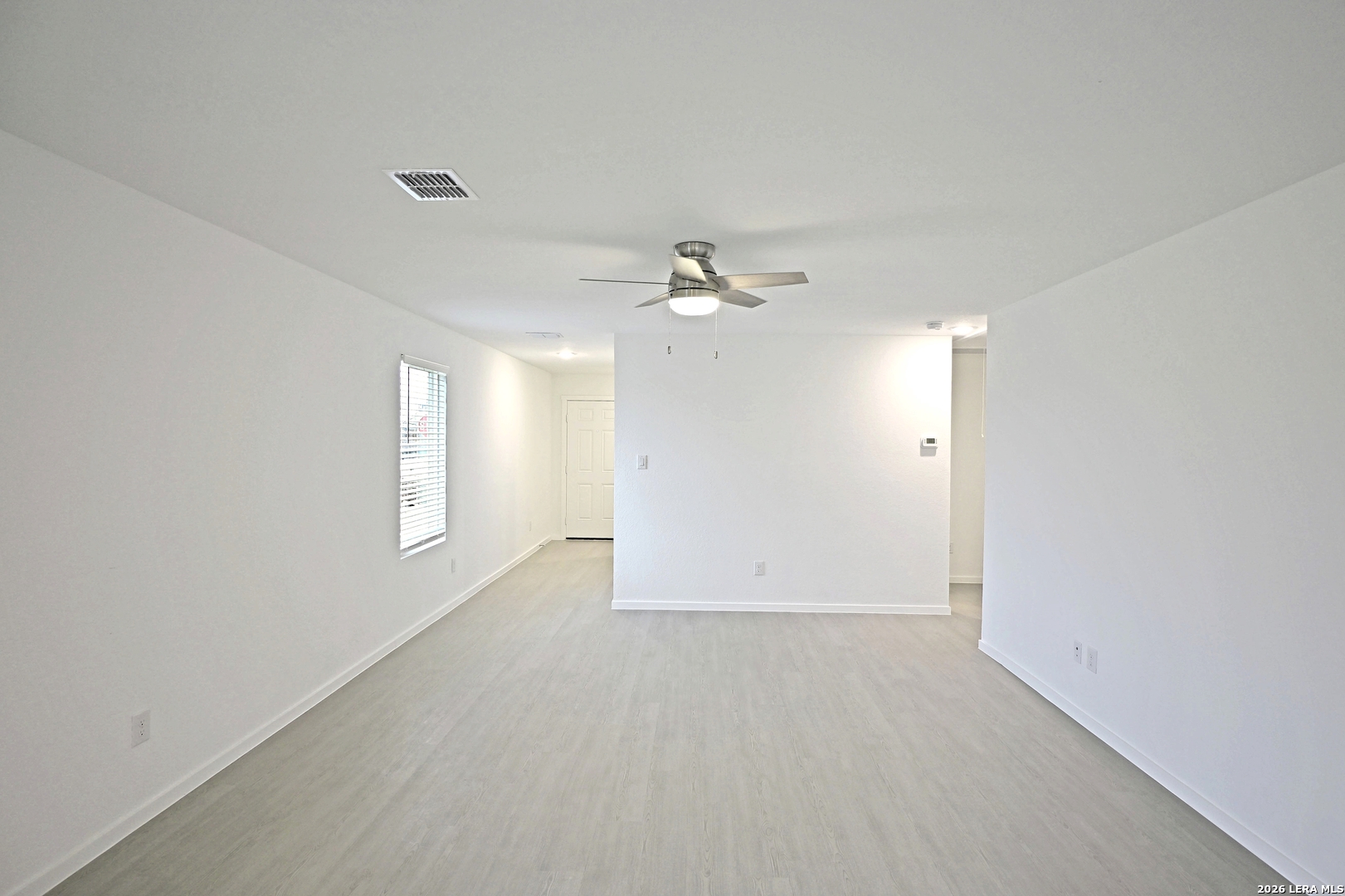 9902 Mather Way Converse, TX 78109 - Photo 4 of 18 a view of an empty room with a window