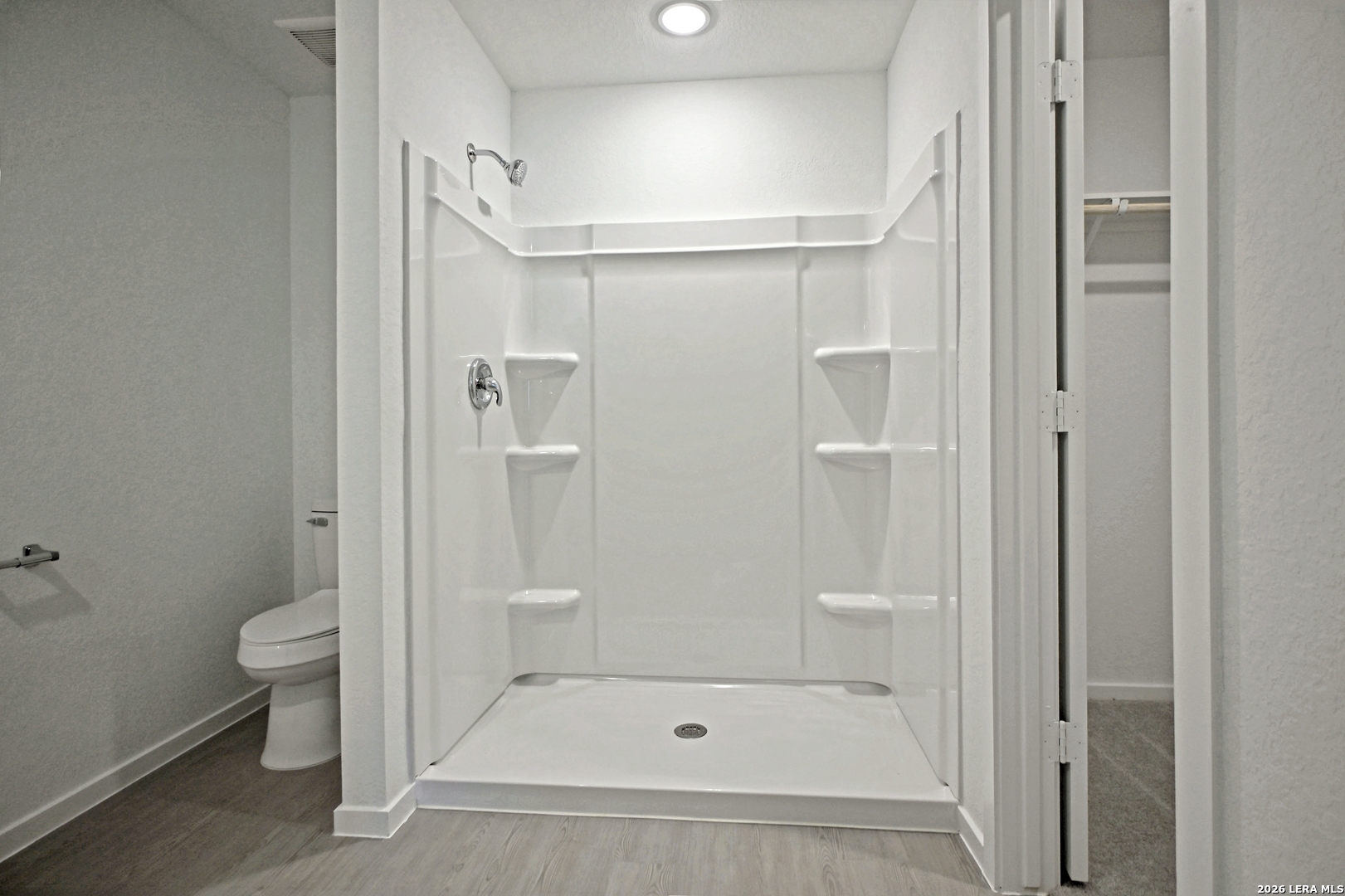 9902 Mather Way Converse, TX 78109 - Photo 9 of 18 a bathroom with a shower and a toilet