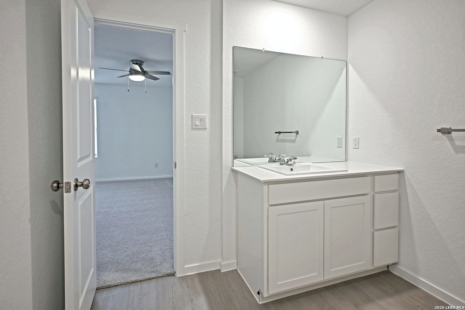 9902 Mather Way Converse, TX 78109 - Photo 10 of 18 a bathroom with a sink and a mirror