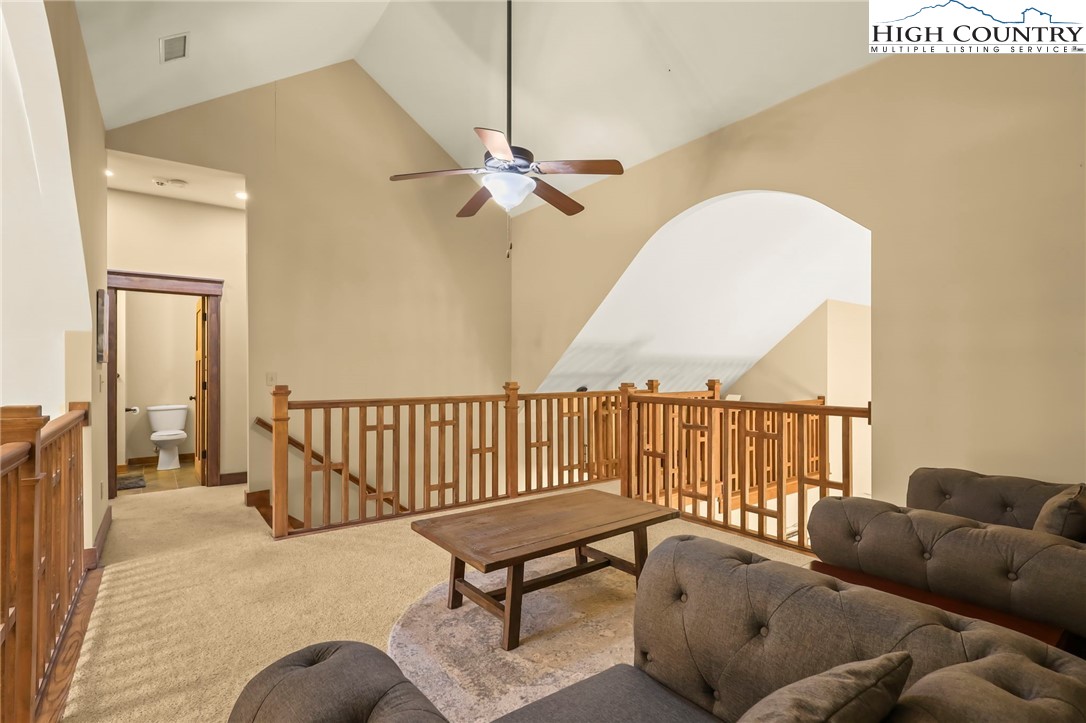 138 South Camp Road, Unit 103 Boone, NC 28607 - Photo 47 of 50 a living room with furniture and a chandelier