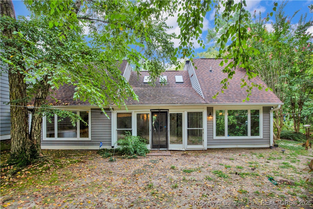 2375 Raeford Road Fayetteville, NC 28305 - Photo 2 of 39 front view of a house with a tree