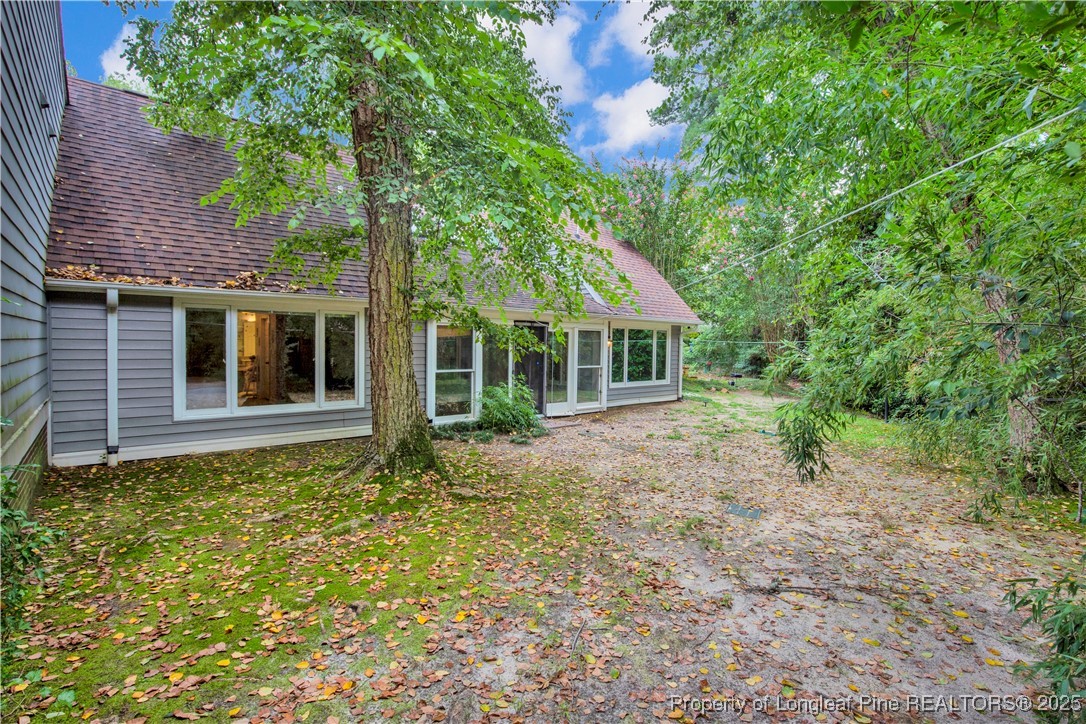 2375 Raeford Road Fayetteville, NC 28305 - Photo 34 of 39 a backyard of a house with seating space