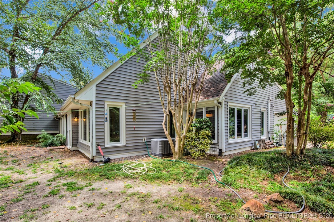 2375 Raeford Road Fayetteville, NC 28305 - Photo 35 of 39 a front view of a house with garden