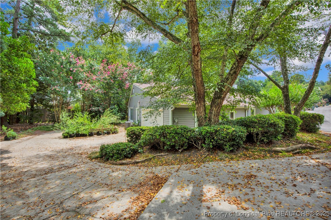 2375 Raeford Road Fayetteville, NC 28305 - Photo 38 of 39 a front view of a house with garden