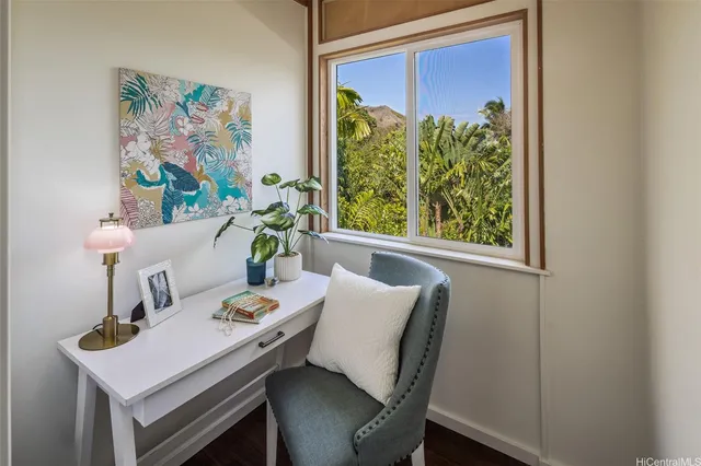 a view of a dining room with furniture window and outside view