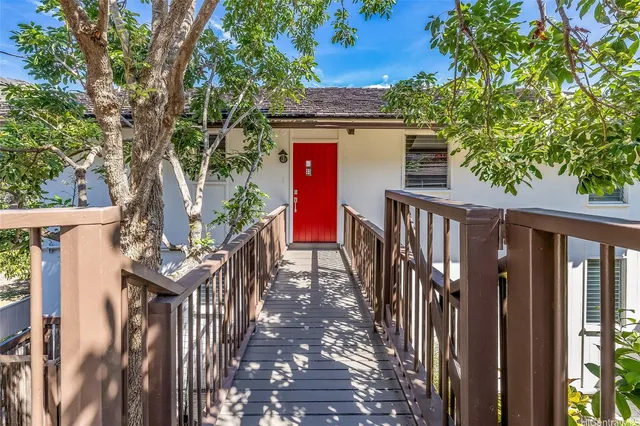 a view of street from balcony