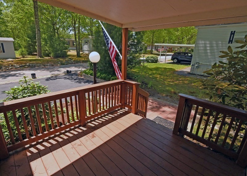 197 Windswept Road Wareham, MA 02571 - Photo 4 of 26 a view of a balcony with wooden floor