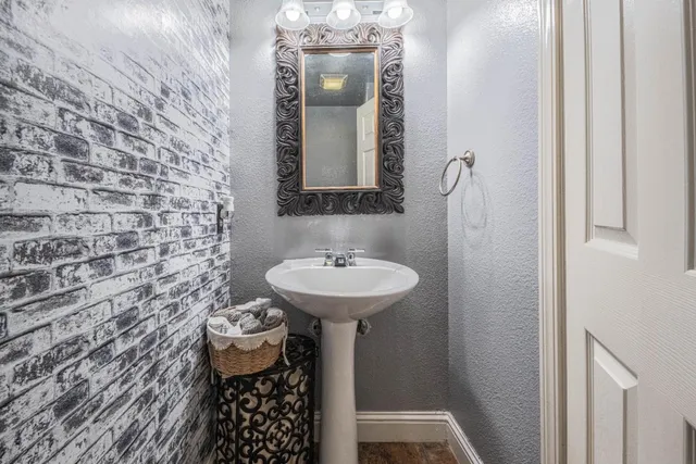 a view of a bedroom with washer and dryer