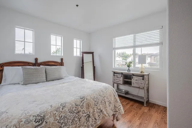 a bedroom with a bed and a closet