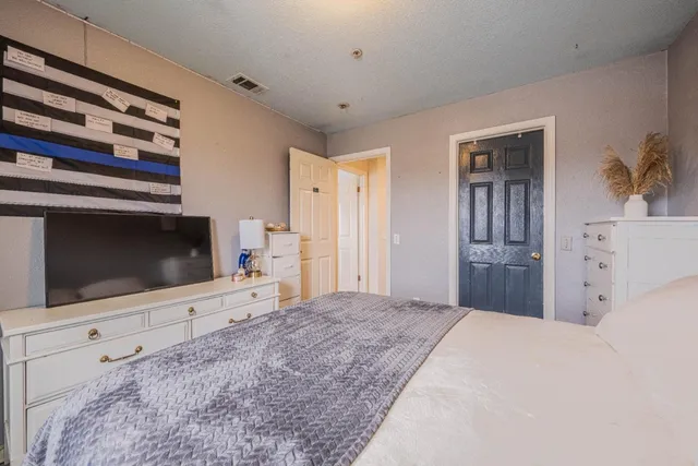 a bathroom with a bathtub and a sink