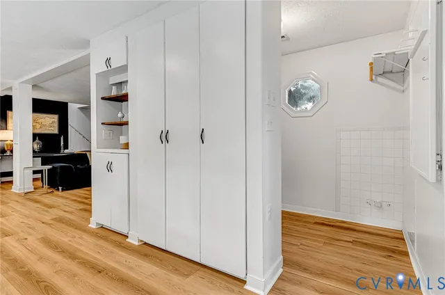 a view of a kitchen from the hallway